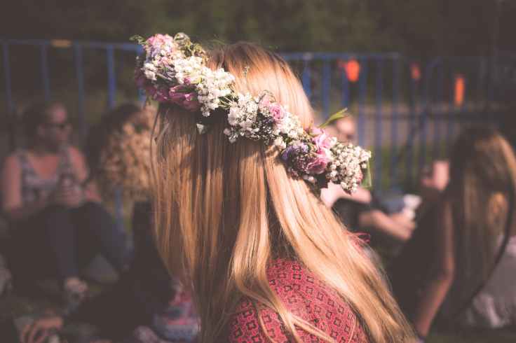 women s green and white floral headband during nighttime
